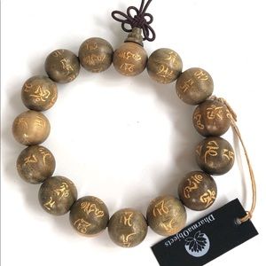 Sandal wood engraved with Tibetan prayer bracelet